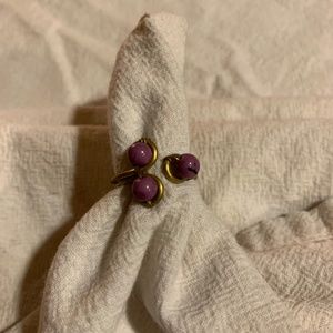 Hand crafted ring with purple beads